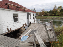 View of one of the Sandy-damaged homes prior to acquisition and removal. Photo credit: Town of Westport.