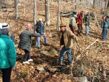 Nearly 50 hikers turned out to enjoy an early spring visit to the property to learn about the history, geology and ecology of Banningwood. Photo Credit: Angie Falstrom